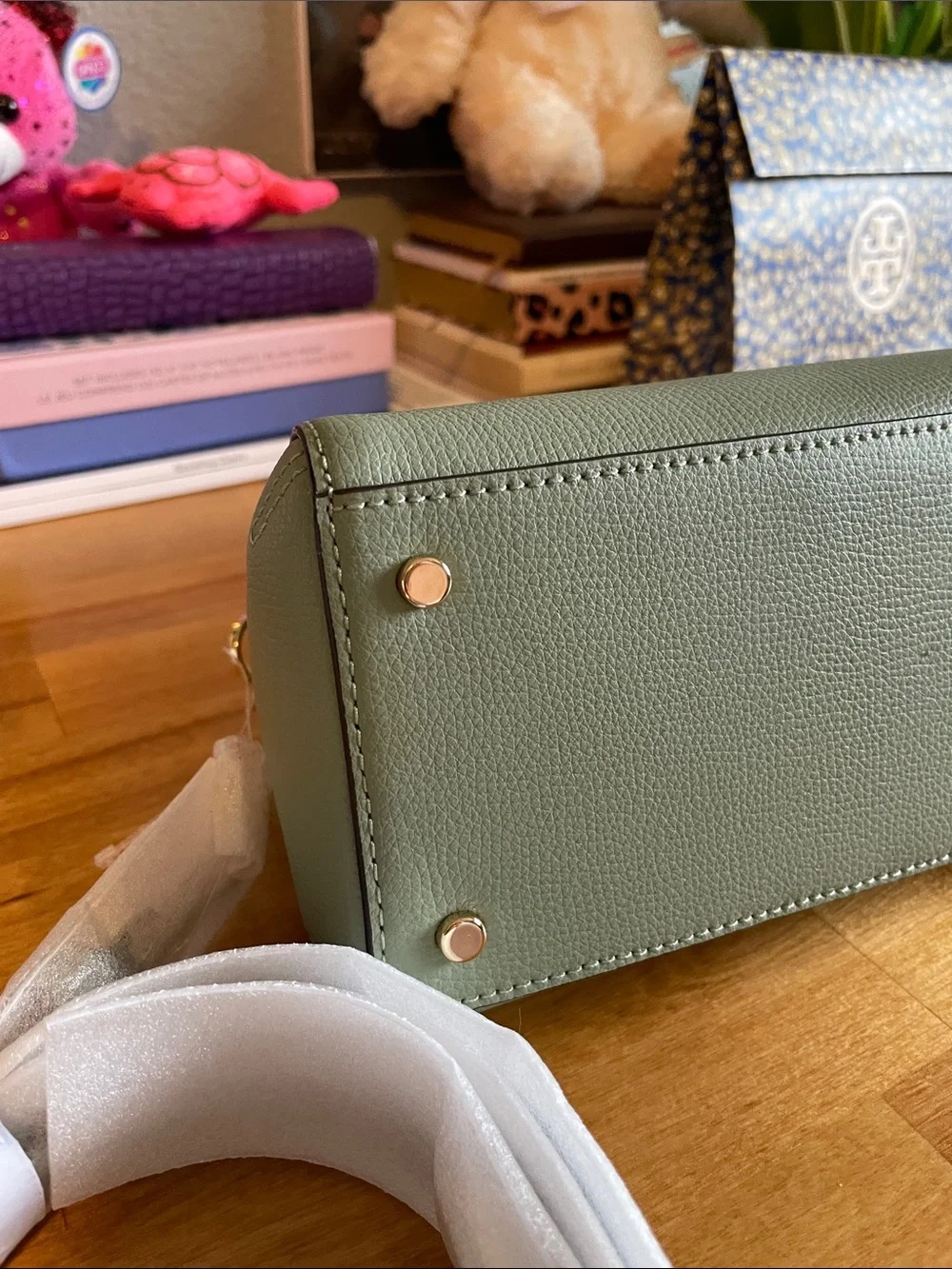 The Kate Spade KK114 refers specifically to the Phoebe East West Satchel